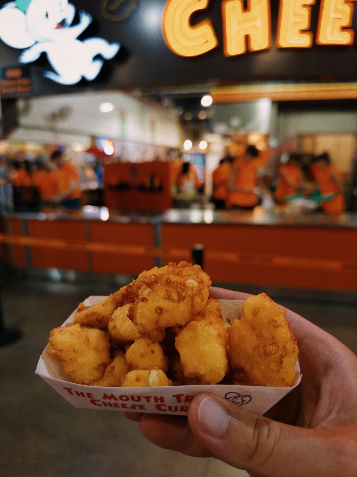 Fried cheese curds piled in a tray