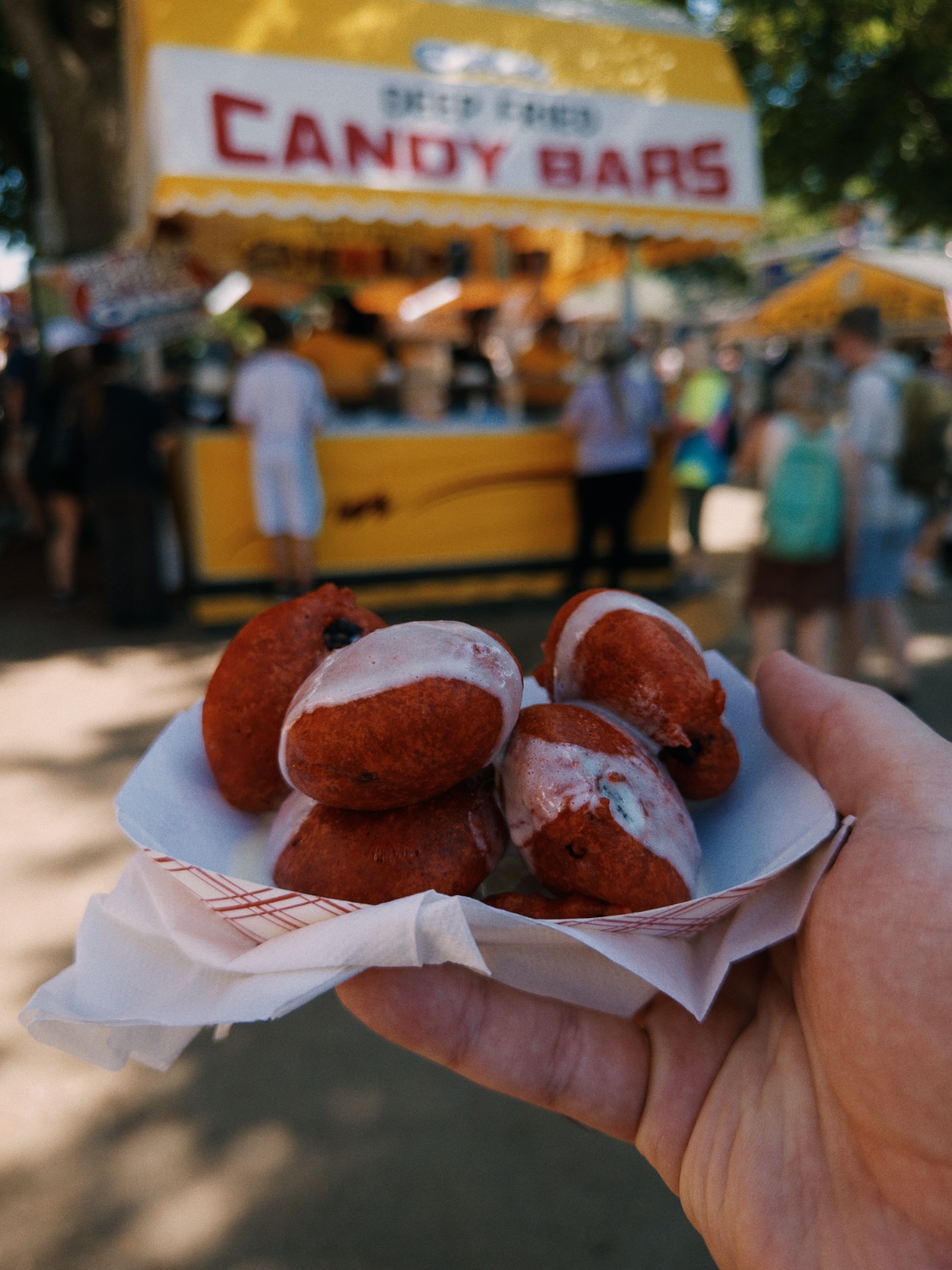Red fried Oreos drizzled with white icing