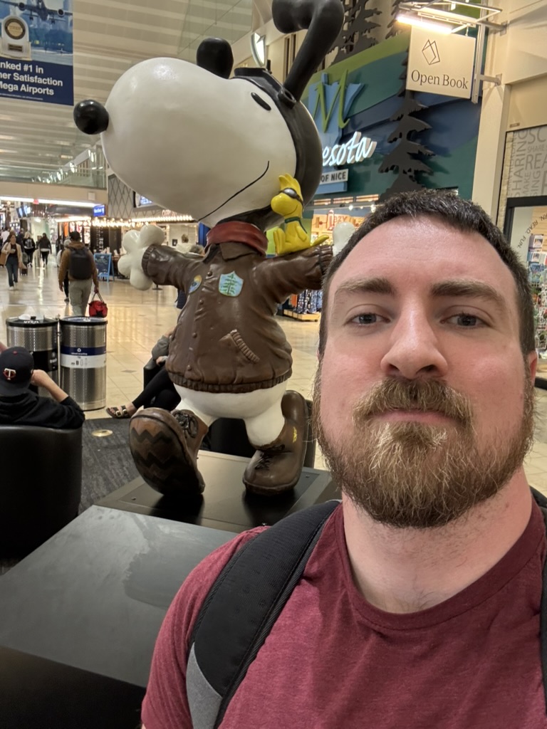 A selfie of me in front of Snoopy The North Star Flying Ace